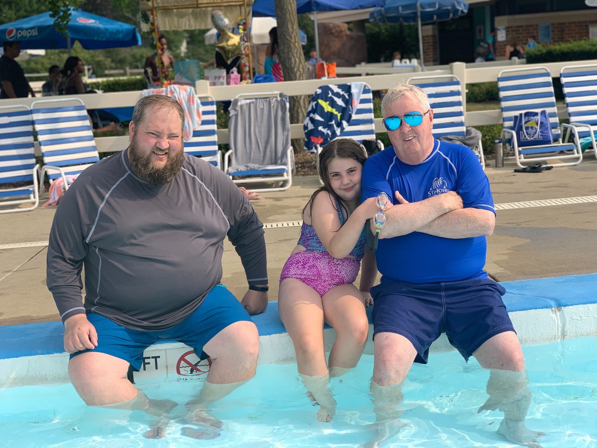 Tom with family at the pool