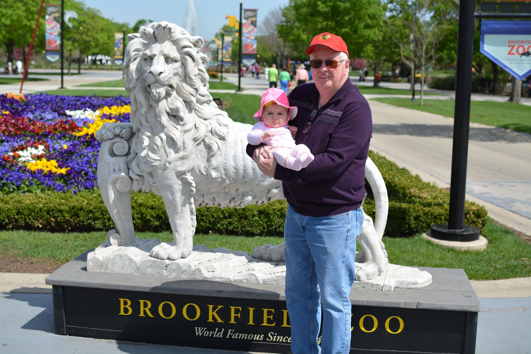 Tom with a child at Brookfield Zoo