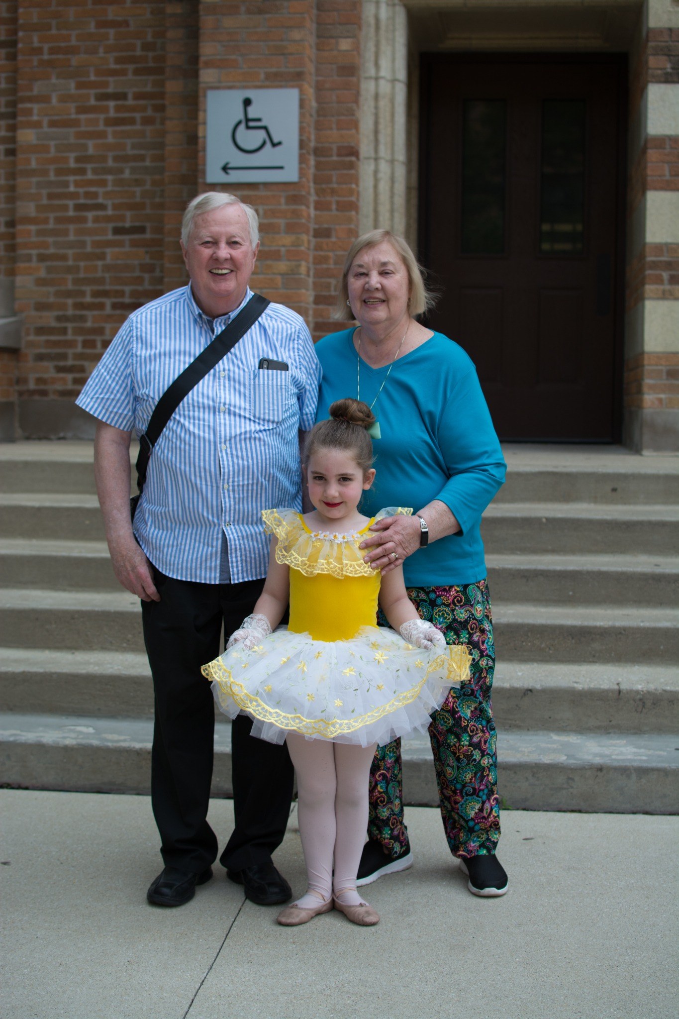 Tom and family with a young dancer