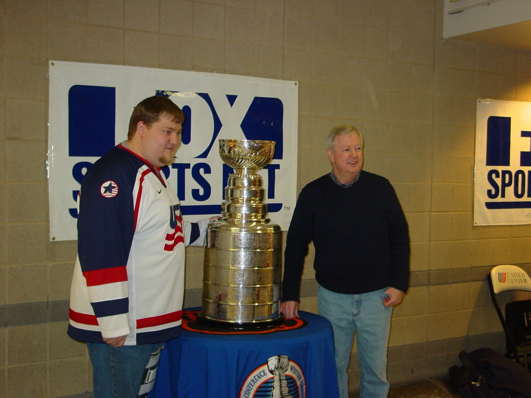 Tom Snyder beside the Stanley Cup